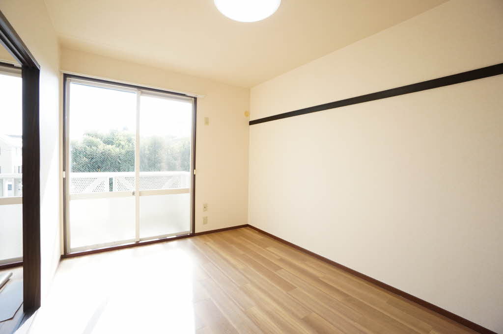 サニーハイツかにら B201号-4